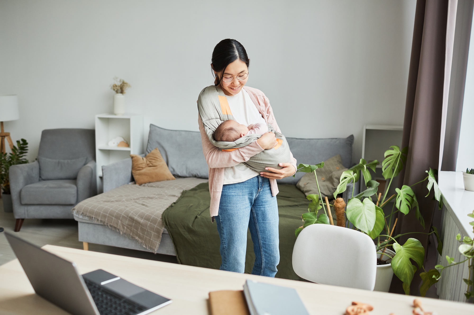 Mom putting the baby to sleep