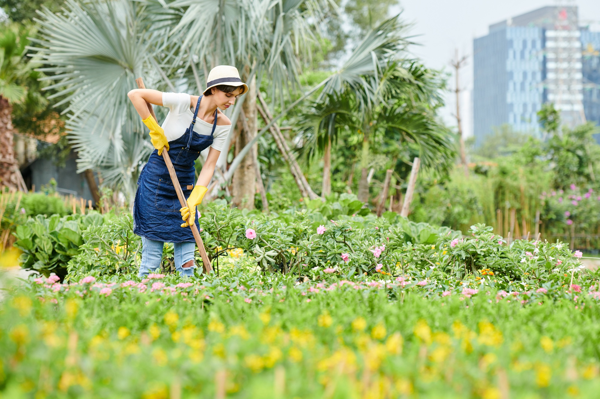 Woman working in public garden